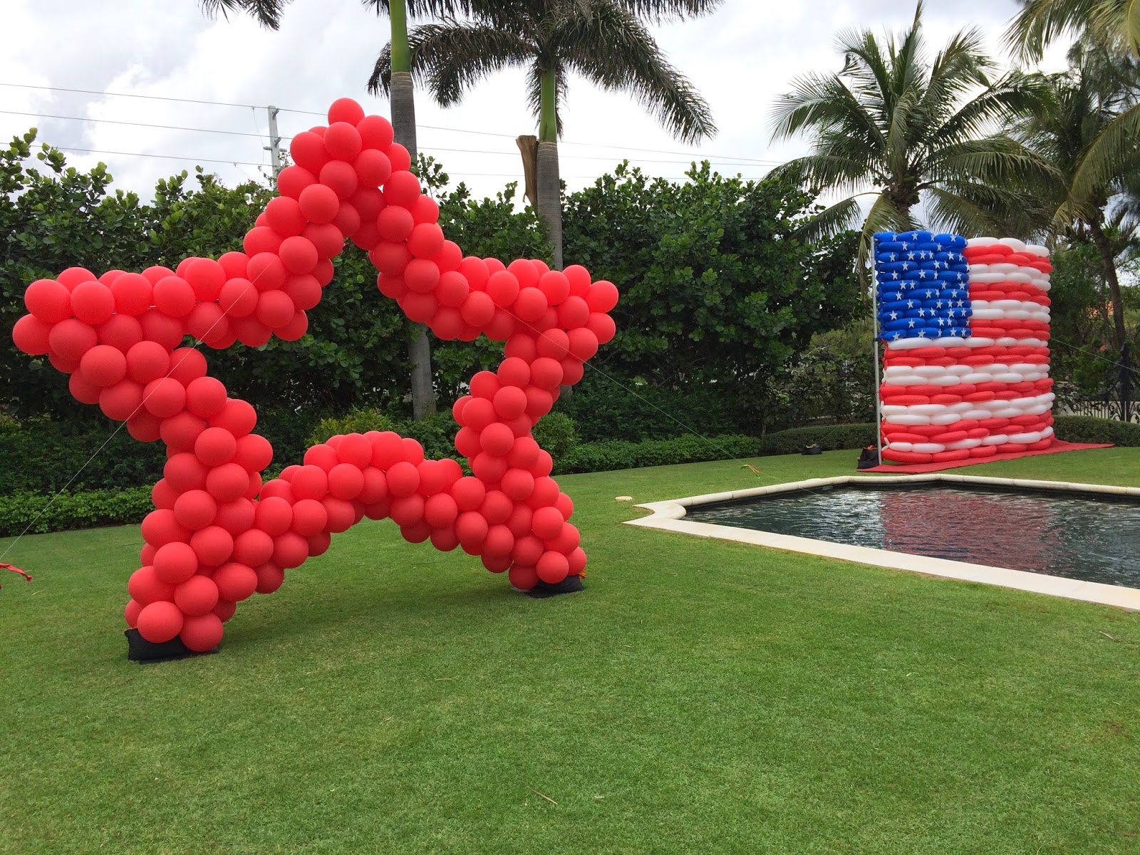  Red star and American flag by balloons for photoshoot