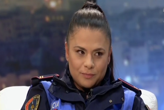 Fetije Kasaj dressed as a police officer