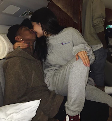 Tyga and Kylie Jenner loved up as they fly in their private plane