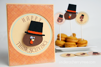 http://underacherrytree.blogspot.com/2013/11/thanksgiving-cupcake-toppers-and-card.html