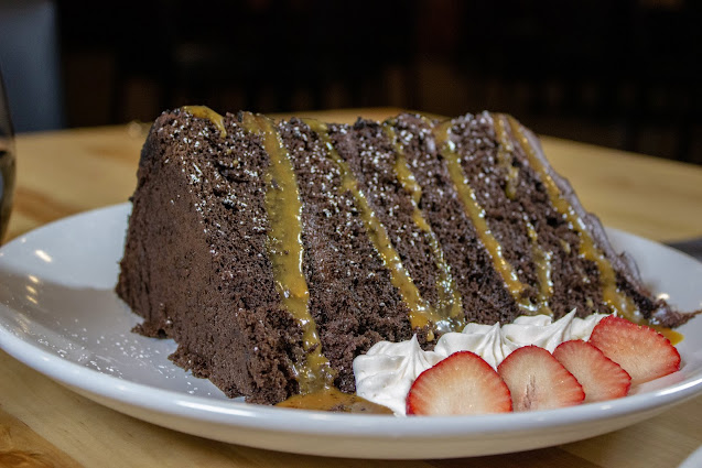 Decadent Towering Chocolate Cake from Wissota Chophouse. Image courtesy of Wissota Chophouse.