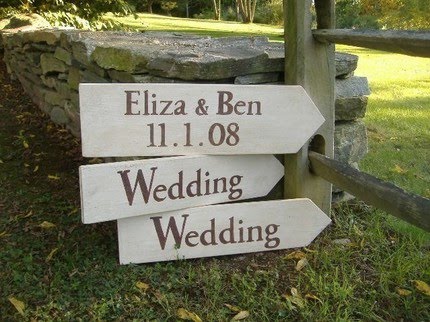 Try searching etsycom for these great wedding signs