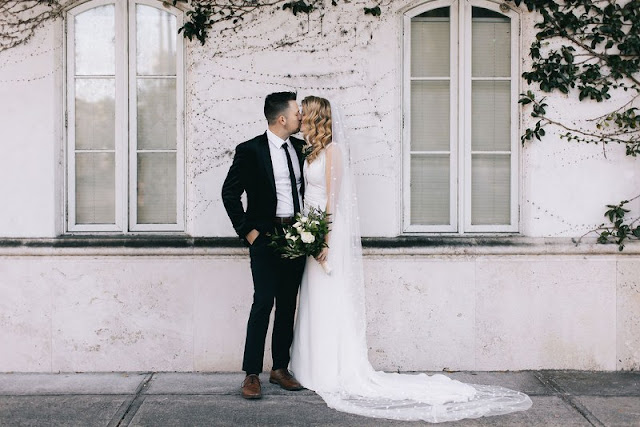 bride and groom kissing