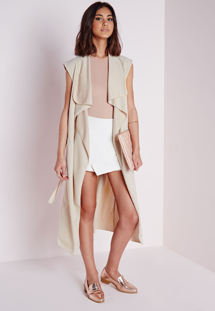 https://www.missguided.co.uk/clothing/category/coats-jackets/sleeveless-belted-waterfall-duster-camel