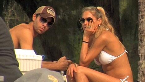 Anna Kournikova is white hot in a string bikini on a romantic getaway with 