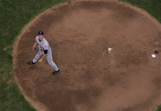 awesome photo of Glavine tracking a popup