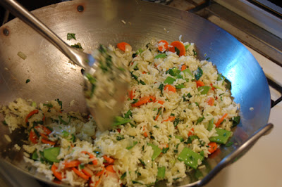 Here I am further along in the process and have added snowpeas, spinach and the rice.