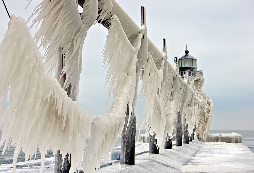 Stunning Frozen Lighthouses Caught In The Winter’s Icy Grip On Lake Michigan