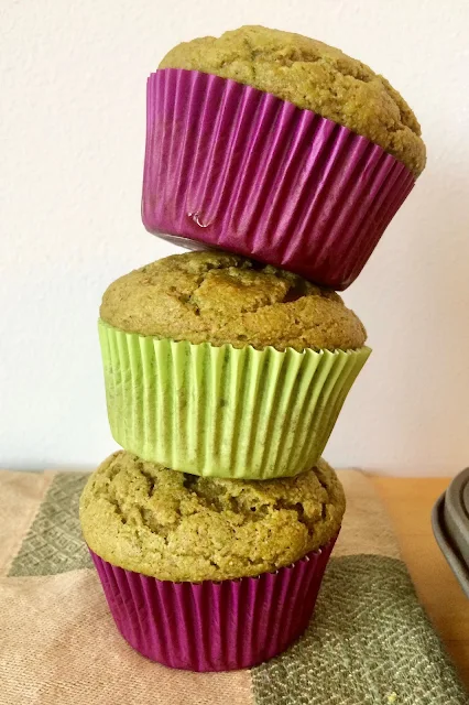 Stack of three muffins.