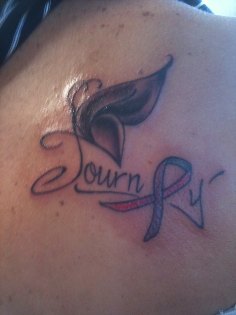  journey tattooed on my back with the cancer ribbon as the letter e and 