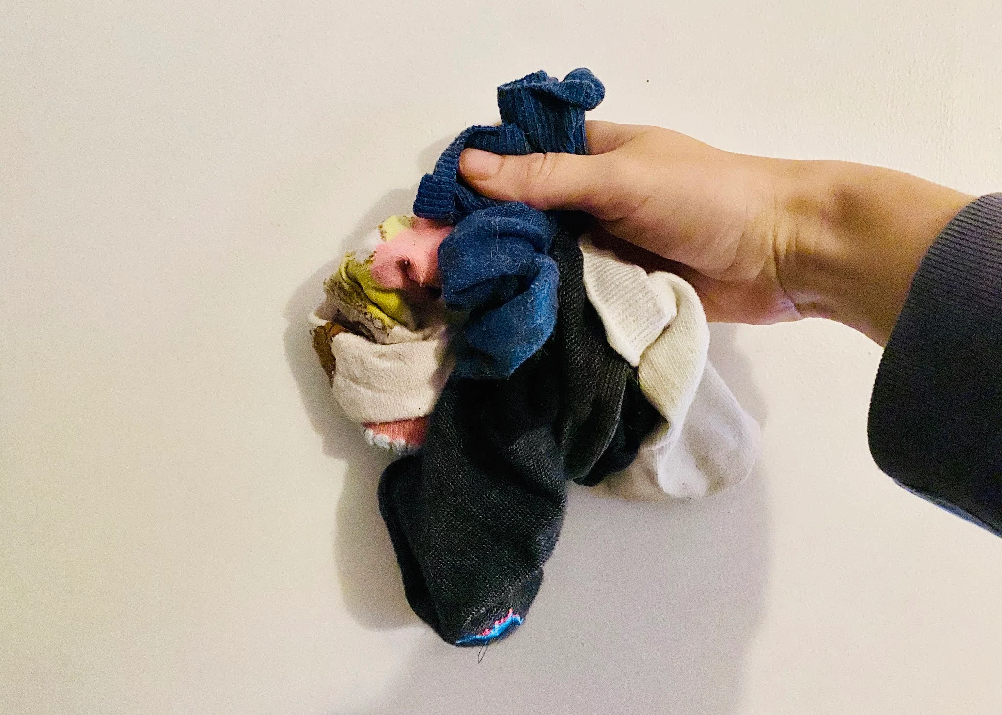 A handful of odd socks found abandoned all over my house