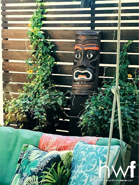 beach style,coastal style,colorful home,DIY,diy decorating,home decor,on the porch,outdoors,summer,tiki style,tropical style,wreaths,painting,re-purposing,up-cycling, painted plastic tiki mask,outdoor tiki decor,outdoor decor.
