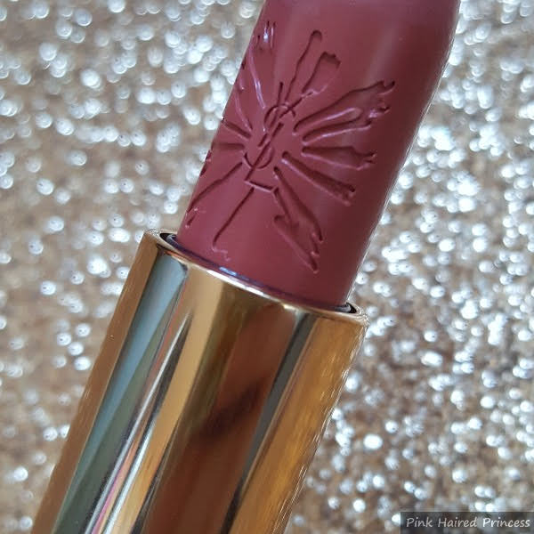 close up of limited edition engraving on side of YSL lipstick for Christmas collection