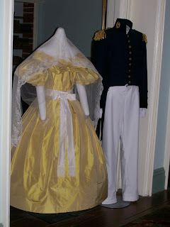 Reproductions of Robert and Mary Lee's portrait clothing.
