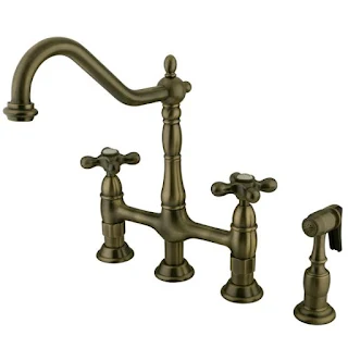 Kingston Brass Heritage Bridge Faucet with Brass Sprayer in Vintage Brass finish