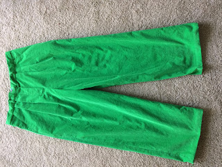 green corduroy pants with two pleats sewn at home