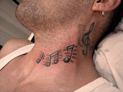 bird and music notes tattoo Sporting a tattoo is