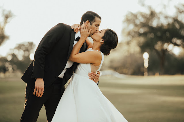 bride and groom kissing