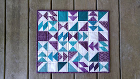 mini purple and teal chaos quilt turned into a puzzle