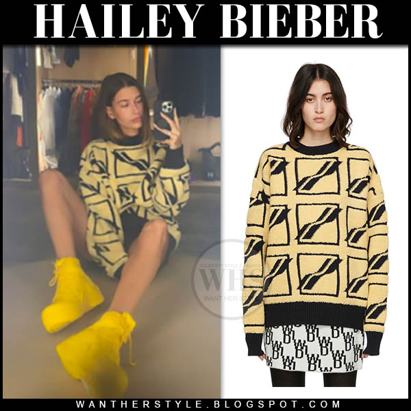 Hailey Bieber in yellow printed sweater and yellow ankle boots