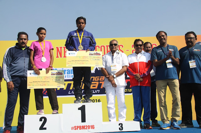 Winners at the podium (Full Marathon Elite Female): (L - R) Jyoti Gowate and Jyoti Singh