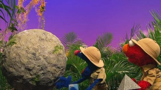 Sesame Street Episode 4526. Grover and Elmo play two travelers searching for a pyramid in a forest.