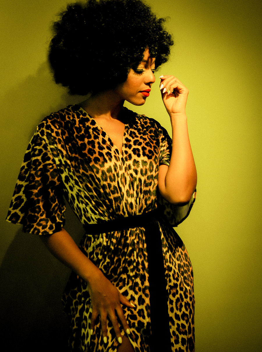 black women in leopard dress with afro fashion photography by alexandra king