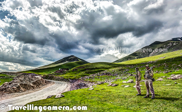 Peer Ki Gali is an amazing place on old Mughal road in Jammu & Kashmir State of India. This place is the highest passes on Srinagar Rajouri historic Mughal Road at 11300 Feets... Let's check out this Photo Journey to know more about this place with appropriate photographs...Various water streams can seen flowing through snow covered peaks of Peer-Ki-Gali hills. Cool freeze, freshening environment and roaming clouds all over makes this place wonderful. After talking to various folks at Peer ki Gali, we got to know that almost every day it rains on these hills. We spent two days around it and we also experienced rain showers both the days...Here is a photograph of a shopkeeper inside his small shop made up of stones. He had almost everything that is usually required for routine life in hills. These families come to these high hills with their cattle, as this place has got more than enough grazing land which becomes a problem during a particular time of the year. Ziarat of Peer Baba on hill top has gained its popularity. Almost every vehicle passing by Peer-ki-Gali stops here to enjoy the panaromic view as well as to take blessings of Peer Baba. Green layer on Peer-Ki-Gali hills looks amazing and it's a huge range of hills with green meadows...Shepherd sitting in these green hills around Peer ki Gali... Almost every alternate hill was full of sheeps and horses... This trend was only noticed around Peer-Ki-Gali on Mughal Road...In past this place have been of great interest for trekkers and now easily accessible for others as well. Tourism is picking up in this region of Jammu and Kashmir now. This will not only boost the economy of the state but also open new aspects to the residents.CRPF folks can seen here and there around these hills to make every person safe on these hills around Peer ki Gali. Really these folks are working really well to give confidence to common people to enjoy the beauty around Mughal Road.Sheeps all around in green hills of Peer Ki Gali, Kashmir, India.All these water streams make the whole environment more beautiful. All these streams have chilling water of melted snow of hill-tops. Dark clouds covering blue sky with lush green hills having multiple white-water streams - this whole combination makes Peer-Ki-Gali a unique place.Local folks on this stretch can organize various trekking trips with all arrangements for lodging in tents or some othe wooden houses, which can good source of income going forward.Jammu and Kashmir state of India is known as heaven on earth. In the seventeenth century the Mughal emperor Jahangir set his eyes on the valley of Kashmir and Peer-Ki-Gali is one of the place they used to stay. There is an old Mughal Residence in deep valley. Mughals said that if paradise is anywhere on the earth, it is here, while living in a houseboat on the mesmerizing Dal Lake.  In Jammu and Kashmir the most important tourist places are Kashmir, Srinagar, the Mughal Gardens, Gulmarg, Pahalgam, Jammu, and Ladakh...It will take a long more time to further develop the area but nobody can deny that it's magical. This whole stretch is magnetic. It draws you closer and closer. As we packed up, the beauty of the place wanted me to linger more. But I returned home with some amazing memories to cherish forever; vivid pics in the heart and mind that won't fade or get lost ever. It is a place that can't be expressed in words and that can't be explained in pics; just plan a trip and experience it all yourself.Before militancy intensified in 1989, tourism formed an important part of the Kashmiri economy. The tourism economy in the Kashmir valley was worst hit. Many five stars in Srinagar can be seen which are not well maintained now and owners can't afford to spend more on those properties. However, the holy shrines of Jammu and the Buddhist monasteries of Ladakh continue to remain popular pilgrimage and tourism destinations. Every year, thousands of Hindu pilgrims visit holy shrines of Vaishno Devi and Amarnath which has had significant impact on the state's economy.The Vaishno Devi yatra alone contributes Rs. 450+ crores to the local economy annually.Tourism in the Kashmir valley has rebounded in recent years and in 2009, the state became one of the top tourist destinations of India. Gulmarg, one of the most popular ski resort destinations in India, is also home to the world's highest green golf course. However with the decrease in violence in the state has boosted the states economy specifically tourism.Peer ki gali has religious importance as well. Most of the folks crossing through this place, stop by and spend some time around the mazar of Peer baba. This is of the holy places for Muslim saints. Here people from almost all the religions comes in large number to pray, on Thursday.There are some beautiful waterfalls around Peer Ki Gali and number/flow depends upon the time of the year & amount the snow these hills have got. Some of them are seasonal and many of them can be seen during most of the year.Kashmir's official language is Urdu. However the main languages spoken are Kashmiri in the Kashmir Valley, Ladakhi in Ladakh and Dogri in Jammu. Most people can speak Hindi as a second language. As elsewhere in India, English is fairly widely spoken among the educated classes and those involved in the tourist industry.Here i a photographs showing typical style of houses in Peer-Ki-Gali on Mughal Road in Jammu & Kashmir state of India. Mainly made up of rock-stones and flat roof made up of wood & mud. They are quite spacious and are seasonal. People go down to their main towns during snowfall in this region.A view of deep valley with curved roads from Peer-Ki-Gali, Jammu & Kashmir, India.