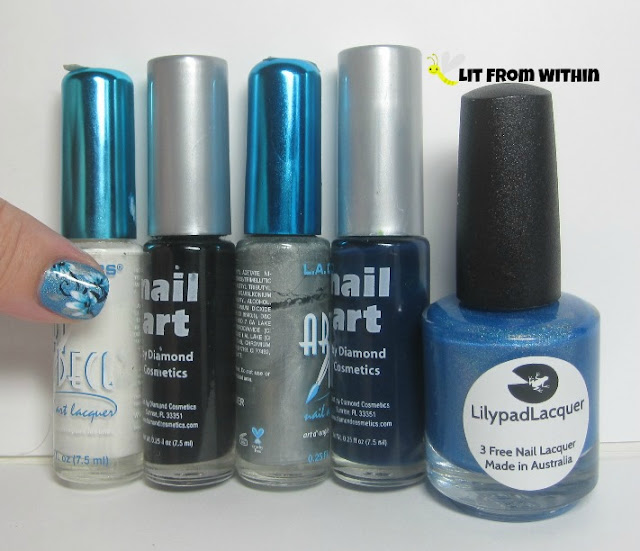  nail art stripers in white, black, silver, and a dark blue jelly, as well as Lilypad Lacquer Bluebell