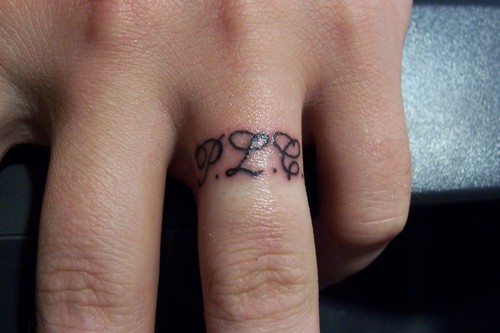 diamond tattoos on fingers. Tess Taylor Finger Tattoos