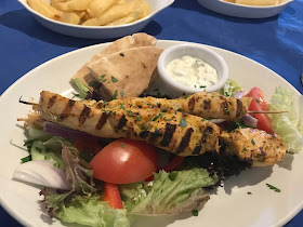 chicken kebab main meal with salad and dip