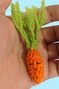 http://translate.google.es/translate?hl=es&sl=en&tl=es&u=http%3A%2F%2Ffreecuteknit.com%2Fvegetable-food-stuffed-toys-fast-easy-tiny-baby-carrot-cute-free-knitting-patterns%2F