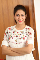 Lavanya Tripathi in Summer Style Spicy Short White Dress at her Interview  Exclusive 229.JPG