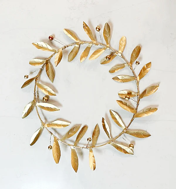 gold wreath with berries