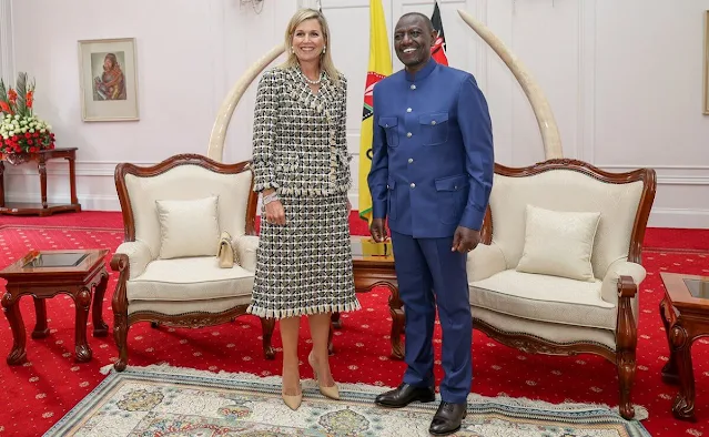 Queen Maxima wore a cotton and wool blend tweed dress and jacket by Oscar de la Renta. Gianvito Rossi pumps. Pearl earrings
