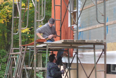 Hank monkeying around on the scaffold.
