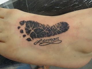Baby footprint tattoos can be made on any part of the body-They can be inked on the back