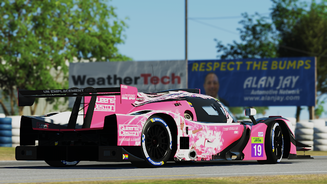 Picture from rFactor 2: a Ligier JSP320 in the Queens' Design colours. It is pink with black matte and glossy white accents. On the sides there is Victoire Laviolette, the team's mascot.