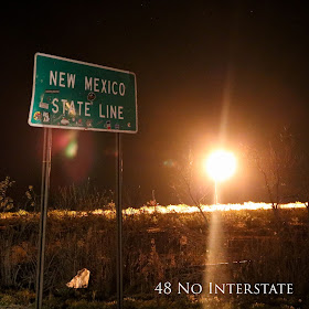 48 No Interstate back roads cross country coast-to-coast road trip Texas New Mexico state line gas flare