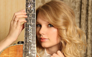 Taylor Swift with guitar 2013