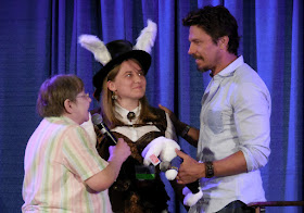Michael Trucco receives his Shore Leave "bunny" at the end of his talk