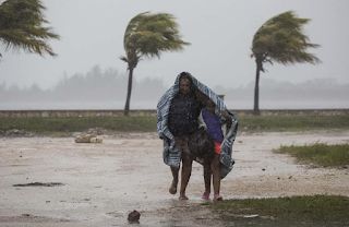 Survivors of Irma beg for aid and face armed looters as they brace for Jose 