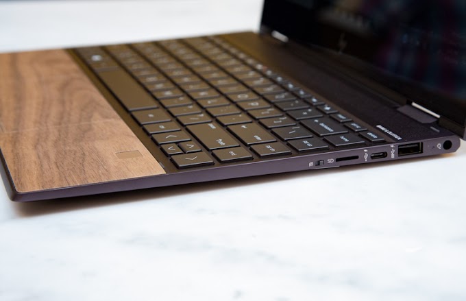 Hp Blend Wood with Metal in New Envy Laptops 