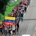  Migrantes venezolanos sale de México hacia EEUU en caravana 