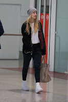 Eugenie Bouchard in Black Leggings at Melbourne Airport