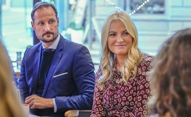 Crown Princess Mette-Marit wore a red floral print blouse by Pia Tjelta. Gabriela Hearst Vesta flared wool blend hopsack trousers