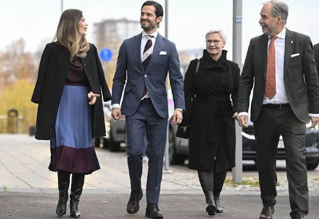 Princess Sofia wore a stretch crepe with colourblock a-line skirt by Hugo Boss, and brown silk satin blouse by Hugo Boss