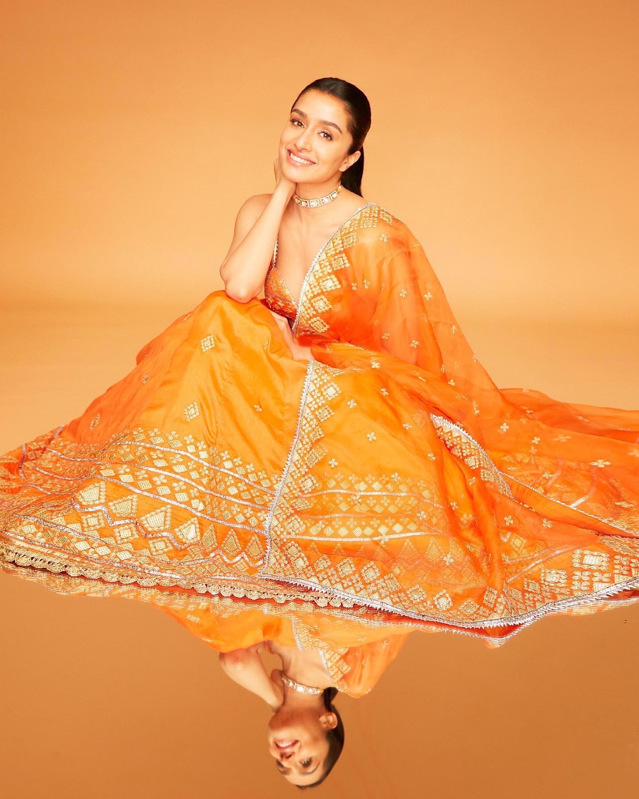 Shraddha Kapoor orange saree cleavage ponytail