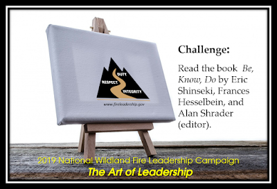 easel with a canvas showing the Wildland Fire Leadership Development Program logo and challenge: Read the book "Be, Know, Do" by Eric Shinseki, Frances Hesselbein, and Alan Shrader (editor). 