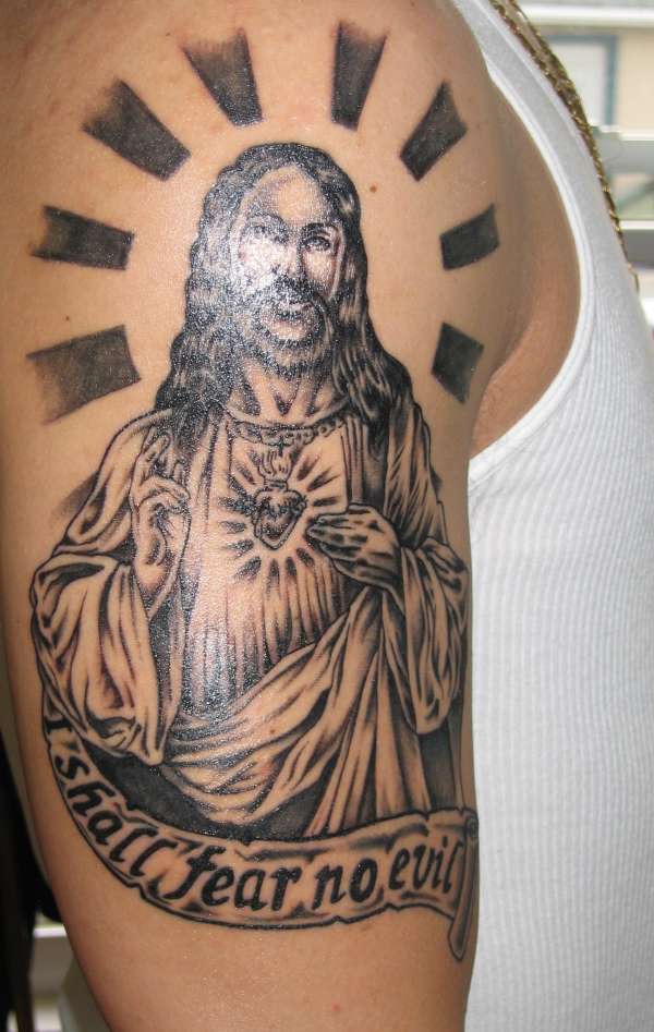 jesus on cross drawing. muscle tattoo. jesus face